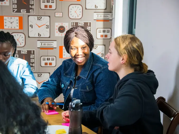 Young people participating in a workshop and sharing ideas.