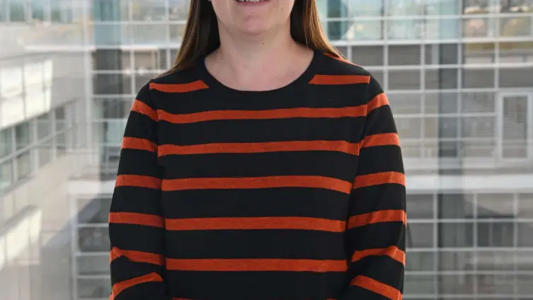 Photo of a person smiling.