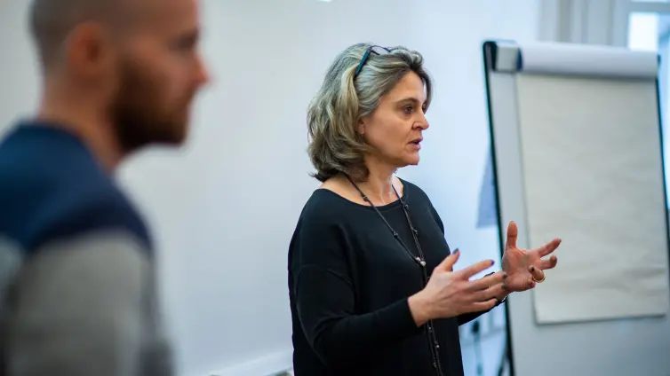 One person explaining something.